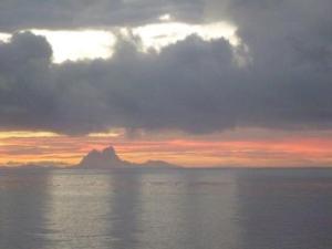 cocktail view-sunset over Bora Bora from our mooring.