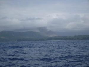 approaching Tanna with smoking volcano visible